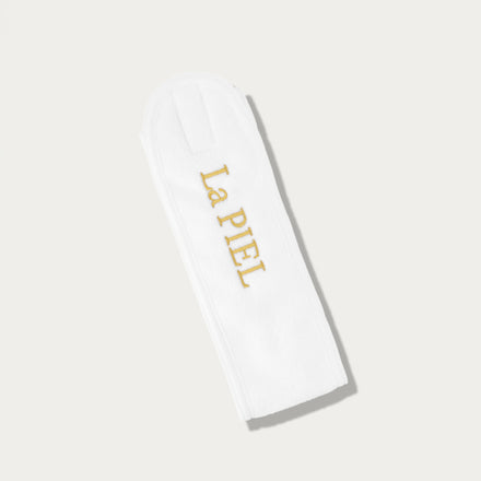 La PIEL Bijela Traka Za Kosu Logo
