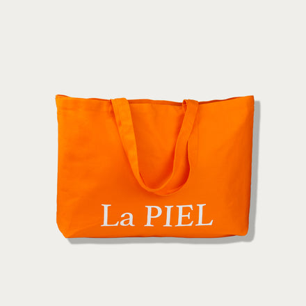 La PIEL Narancasta Platnena Torba Logo